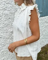 Brazalete rígido de bronce y alpaca maciza, con diseño orgánico irregular.