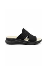 Sandalia zueco Aurora modelo Lycra AU400, con capellada de lycra tejida negra con perforaciones, plantilla acolchada en tono beige y suela anatómica de goma negra.