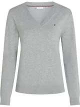 Sweater de punto Tommy Hilfiger, color gris, con cuello en V y manga larga. Presenta un diseño liso con el logo de la marca bordado en el pecho.