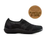 Championes negros de tela tejida con detalles plateados, sin cordones y con plantilla de cuero.