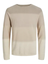Sweater de punto color beige con diseño de bloques de color.