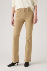 Pantalón de corduroy color beige, de tiro alto y corte flare.