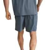 Short de entrenamiento Puma para hombre, color azul grisáceo, con cintura elástica ajustable, tecnología dryCELL y logo estampado en la pierna.