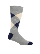 Medias de largo medio con diseño de rombos en tonos gris, azul marino y beige. Presentan puntera y talón reforzados en color azul marino.
