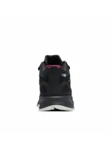 Bota de senderismo Columbia modelo Peakfreak Hera Mid, de diseño impermeable y transpirable. Presenta una estructura en color negro con detalles en bordó, sistema de ajuste Navic Fit, mediasuela con tecnología Techlite+ para amortiguación y suela Adapt Trax con tacos para tracción en terrenos variados.