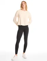 Legging de tiro alto confeccionada en algodón elástico con cintura ancha modeladora. Presenta un calce ajustado y tejido opaco de tacto natural.