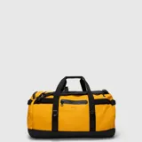 Bolso tipo duffel de color amarillo y negro, con doble asa superior, cierres impermeables, correas de compresión laterales y detalles de la marca estampados.