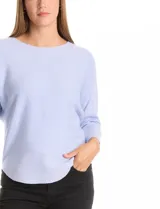 Buzo de punto rib con diseño de manga japonesa en largo tres cuartos y silueta relajada.