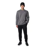 Pantalón tipo jogger de color negro, confeccionado en una mezcla de algodón, con cintura elástica ajustable mediante cordón interior, bolsillos laterales y traseros, y puños elásticos en los tobillos.