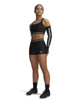 Short tipo calza corta deportivo Under Armour modelo HeatGear Shorty, de color negro con cintura elástica visible que presenta el logo de la marca estampado en blanco.