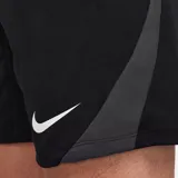 Short deportivo Nike Strike negro con paneles laterales en gris y logo blanco estampado. Confeccionado con tecnología Dri-FIT para mantener la transpirabilidad y la comodidad.