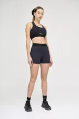 Calza corta de lycra color azul marino, de tiro alto y compresión media.