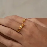 Anillo dorado de plata 925 bañada en oro 18k con piedra citrino en forma de gota.