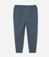 Pantalón deportivo masculino liso color negro, con ajuste elástico en la cintura y bolsillos laterales.