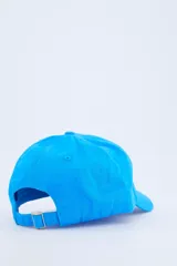 Gorra azul vibrante con visera curva y el texto "common edit" bordado en blanco en la parte frontal.