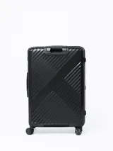 Valija rígida de 28 pulgadas color negro con diseño texturizado, manija retráctil, ruedas giratorias y candado de seguridad integrado.