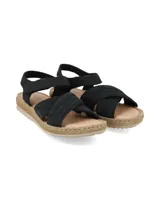 Sandalia de cuero nobuck color negro, con tiras cruzadas en el empeine y tira ajustable con velcro en el talón. Cuenta con suela plana efecto corcho y plantilla acolchada.