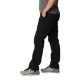 Pantalón convertible de senderismo color negro, con perneras desmontables mediante cremallera que permiten transformarlo en shorts. Cuenta con bolsillos laterales y traseros, diseñado con tecnología de protección solar.