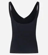 Blusa sin mangas de punto acanalado color crema, con escote en V y espalda descubierta. Confeccionada en una mezcla de viscosa y poliamida, presenta un ajuste al cuerpo y textura vertical en relieve.