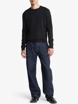 Sweater negro de punto de lana merino con poliéster, cuello redondo y logo CK bordado en el pecho.