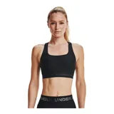 Top deportivo negro Under Armour Mid Crossback, con tirantes cruzados en la espalda y banda elástica con el logo de la marca.