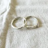 Anillo doble de plata 950 texturada.