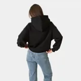 Hoodie oversize negro con capucha y bolsillo canguro frontal, con estampa gris de la marca EM ESTUDIOS en el pecho.