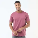 Camiseta de manga corta con cuello redondo, confeccionada en algodón de color rosa.