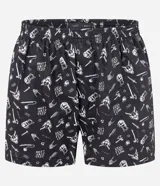 Calzoncillo tipo boxer de tela, color negro con estampado temático de la serie Stranger Things en color blanco. Cuenta con cintura elástica y está confeccionado en algodón ligero y transpirable.