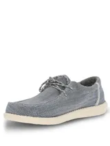 Alpargata Hush Puppies modelo Canyon, color gris con textura tejida. Presenta cordones decorativos y suela de EVA en color crema, diseñada con tecnología ZeroG para mayor ligereza y flexibilidad.