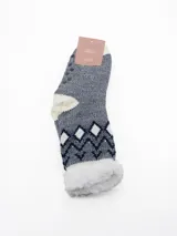 Medias de caña media con interior de sherpa, diseño a rayas horizontales multicolor y suela antideslizante con puntos de silicona.