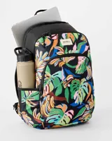 Mochila Rip Curl Ozone 2.0 de 30 litros con diseño estampado de hojas tropicales y bananos sobre base negra. Cuenta con compartimento principal con cierre, bolsillo frontal con cierre, bolsillos laterales de malla y correas ajustables.