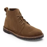 Bota de gamuza color marrón oscuro (dark tea), estilo chukka o desert boot, con cordones y suela gruesa con borde de corcho visible.