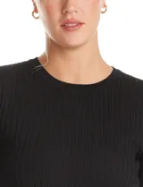 Buzo de tejido acanalado con cuello redondo y manga larga, de corte ajustado al cuerpo.
