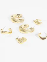 Set de aros plateados con diseño irregular y forma de aro.