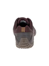 Zapato casual Cat modelo Instruct, confeccionado en cuero marrón con detalles en textil. Presenta cordones al tono, suela de goma flexible con relieve y logo de la marca en el lateral.