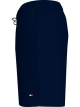 Bañador azul marino de nailon reciclado, con cordón ajustable en la cintura, logo bordado en la parte inferior y parche con logo en la parte trasera.