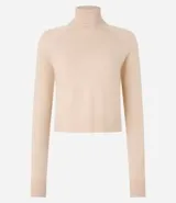 Blusa básica de punto marca Blue Steel, con cuello alto y manga larga. Confeccionada en tejido de punto recto con textura suave y cómoda.