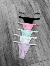 Pack de seis tangas de algodón en colores pastel: gris, negro, rosa, verde agua, blanco y lila. Todas con tiras ajustables.