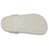Zueco Crocs modelo Classic Crafted, color marrón, con capellada de lona textil y suela de material Croslite. Cuenta con correa de talón pivotante y diseño clásico de la marca.