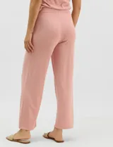 Pantalón tejido de corte recto y diseño fluido, color amarillo, con cintura ancha elastizada.