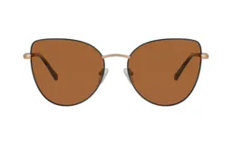 Lentes de sol Teresa Calandra modelo Iman, con marco metálico color petróleo y lentes marrones con forma de ojo de gato.