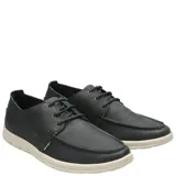 Zapato casual de cuero azul navy tipo náutico, con cordones y suela de goma blanca.