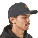 Gorra de visera curva Volcom Workwear, color negro, con estructura de seis paneles y parche frontal rectangular con logo en color naranja.