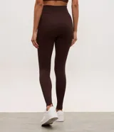 Legging deportiva Get Over de tiro alto, confeccionada en poliamida seamless con diseño ajustado al cuerpo y acabado liso.