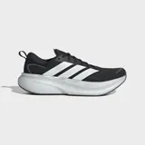 Championes de running Adidas Supernova Glide, color negro con las tres tiras clásicas en blanco y suela con amortiguación gruesa.
