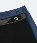 Kit de dos calzoncillos bóxer de poliamida, uno azul y otro negro, con elástico contrastante en la cintura y logo de la marca.