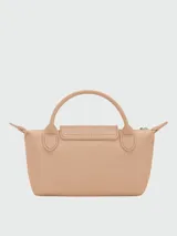 Cartera pouch Le Pliage de Longchamp, modelo compacto en color bordó con asa superior corta y cierre de solapa con botón a presión.