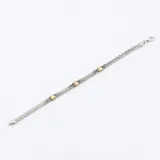 Pulsera de plata y oro con eslabones tipo Bismark.