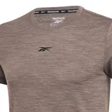 Remera deportiva color marrón con logo Reebok Vector en el pecho.